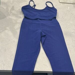 Revolve- Beach Riot Women's Blue sparkle ribbed leggings and matching bralette.